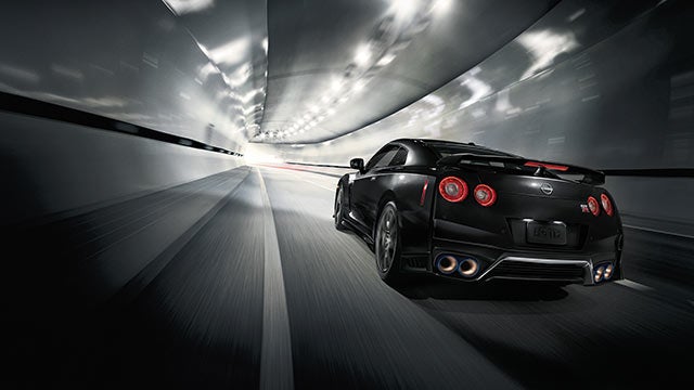 2023 Nissan GT-R seen from behind driving through a tunnel | Wood Nissan of Lee's Summit in Lee's Summit MO